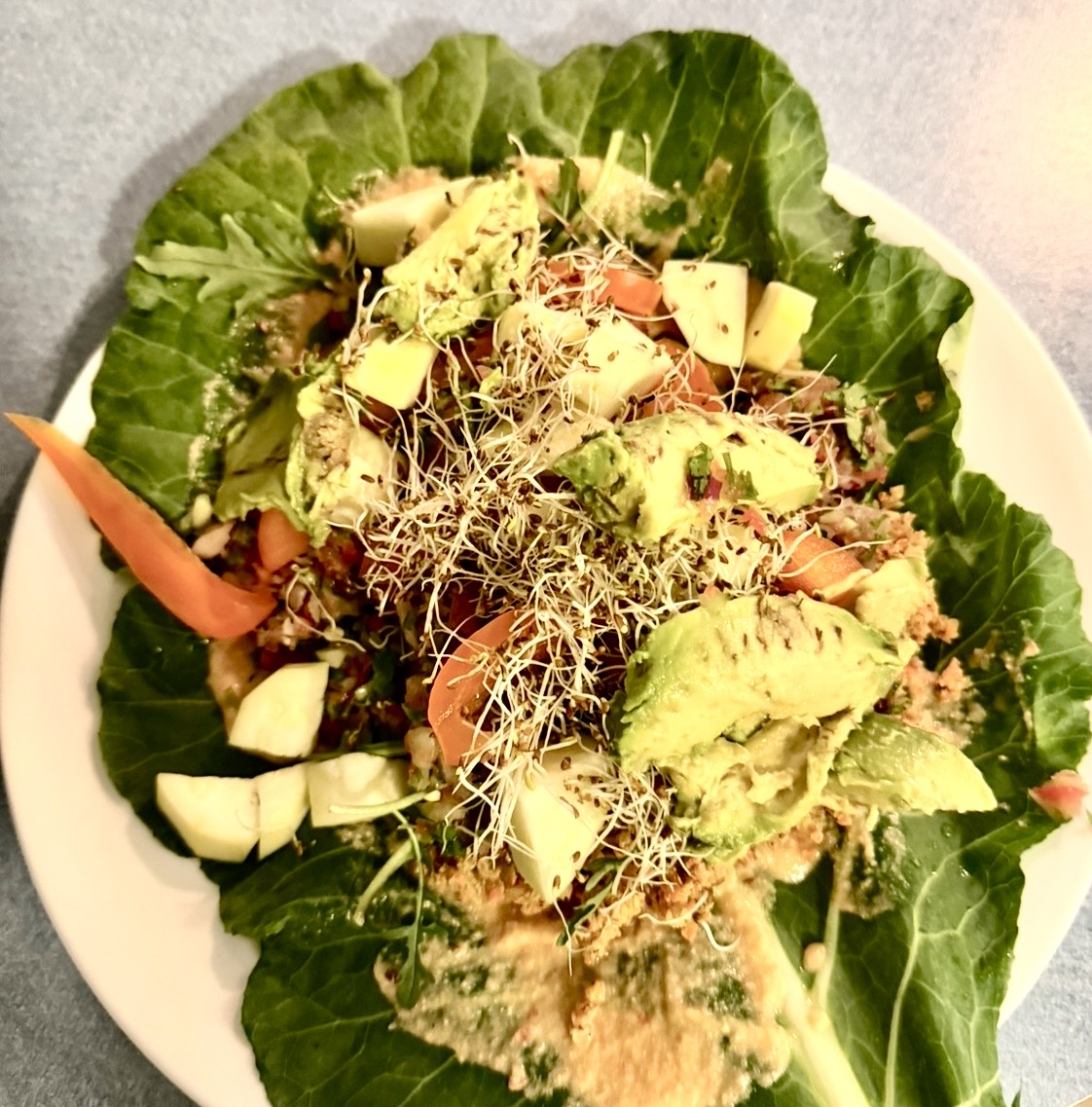 A raw vegan collard green burrito